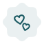 an icon featuring two floating hearts
