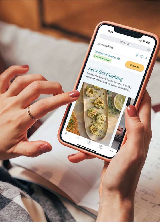 Someone shopping on their phone using the Table platform