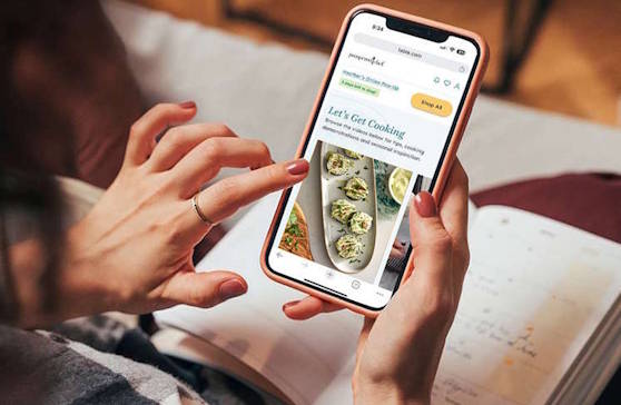 Someone shopping on their phone using the Table platform