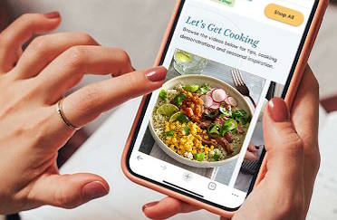 Someone shopping on their phone using the Table platform