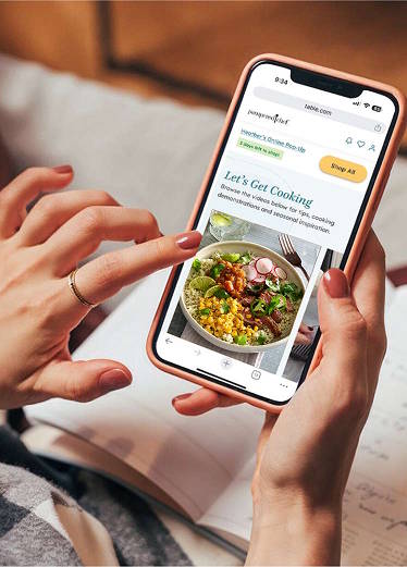 Someone shopping on their phone using the Table platform