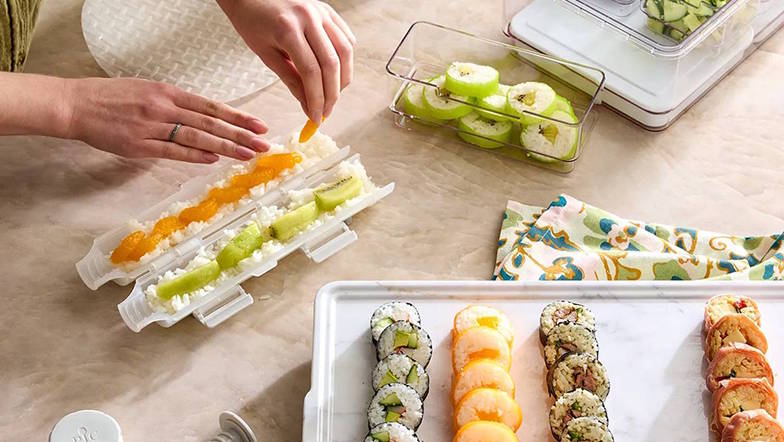 making sushi with the roll maker