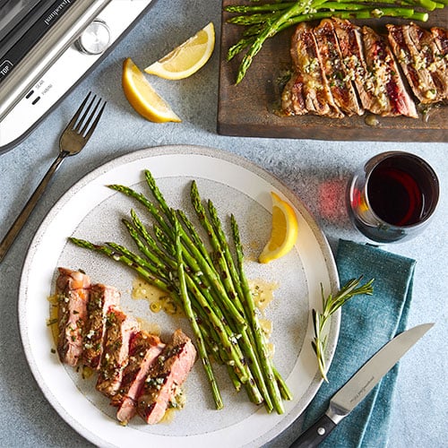 Grilled Steaks & Asparagus With Rosemary Garlic Butter