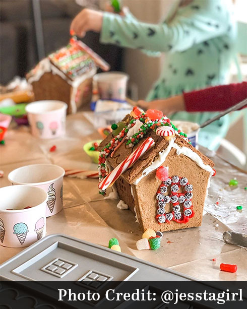 Building gingerbread houses. Photo Credit: @jesstagirl