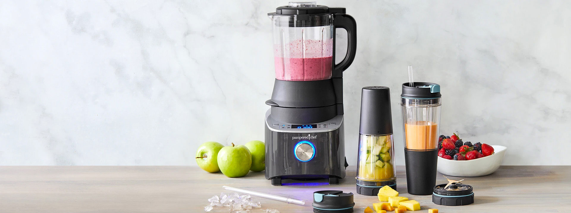 The Deluxe Cooking Blender and Smoothie Cup & Adapter making fruit smoothies